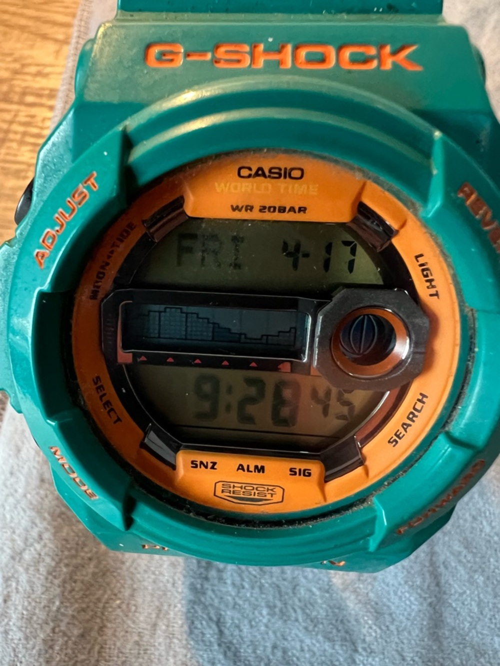 Casio G-Shock Teal and Orange Digital Sports Watch. This is the GLX-150B